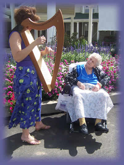 cheryl playing harp